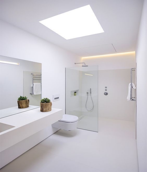 Étapes et conseils pour acheter des lumières LED encastrées-À propos de l'éclairage--A Minimalist White Bathroom With A Skylight A Floating Vanity A Seamless Glass Shower 副本